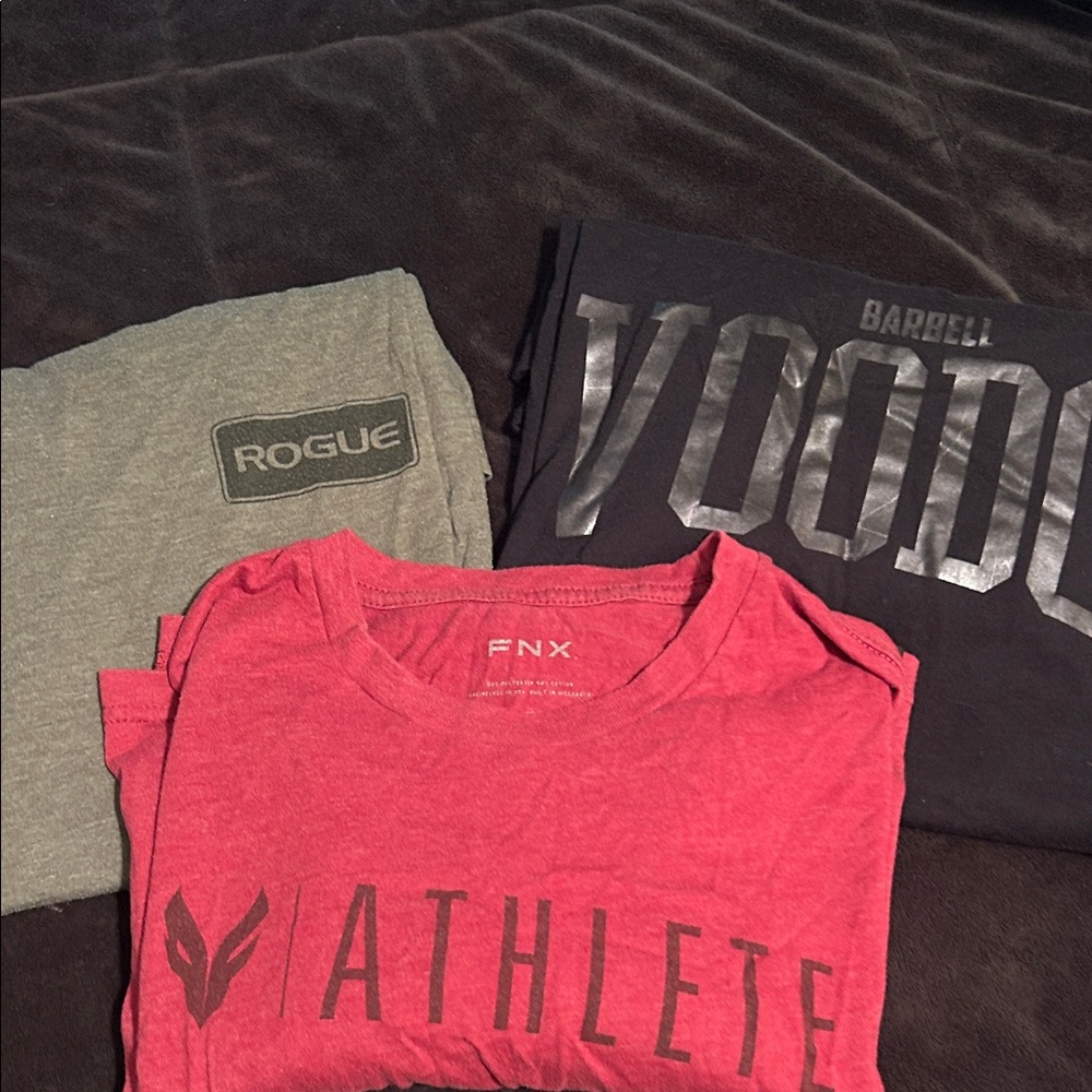 Set of 3 cross fit tees in good used condition.